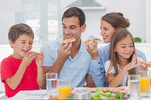 Family eating pizza